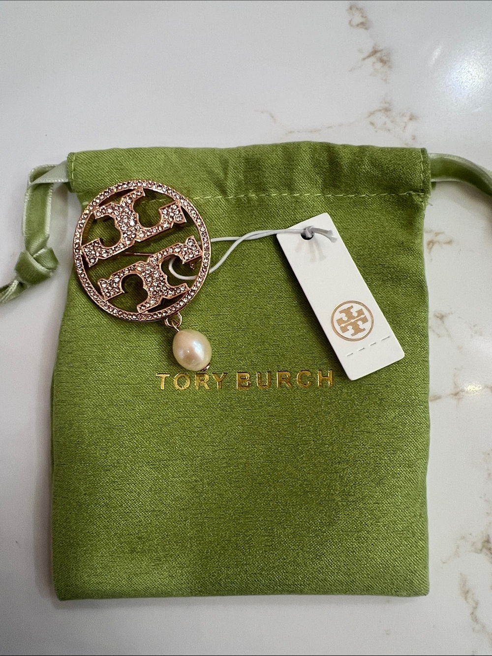 Tory Burch Rose Gold Crystal Logo Brooch with Pearl Drop